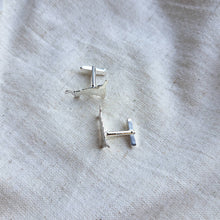 Load image into Gallery viewer, Handmade silver cornish map cufflinks on natural fabric
