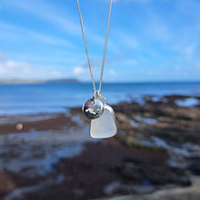 Load image into Gallery viewer, Frosted White Sea Glass & Crashing Wave Pebble Necklace | Cornish Sea Glass Treasure Necklace