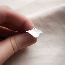 Load image into Gallery viewer, Finger and thumb holding recycled silver Isle of Wight shaped textured brooch