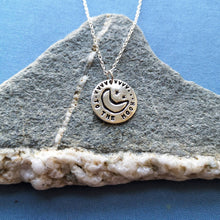 Load image into Gallery viewer, Personalised recycled silver love token coin necklace, engraved with moon and stars motif and ‘to the moon and back’ text