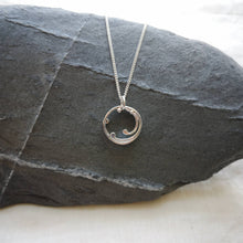Load image into Gallery viewer, Mini recycled silver wave pendant, curved strands and silver ball details, hung from grey slate stone