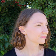 Load image into Gallery viewer, Autumn leaves silver hoop earrings, leaf and berry silver hoops worn against leafy background