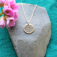 Load image into Gallery viewer, Engraved sunflower disc necklace, with ‘you are my sunshine’ stamped on back 
