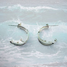 Load image into Gallery viewer, Wild Wave Eco Silver Hoop Earrings with crashing wave background
