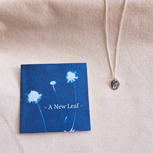 A New Leaf Amulet | Leaf & Star Double-Sided Mini Charm Necklace