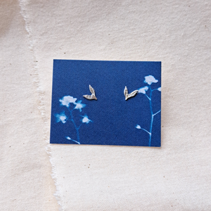 Mini silver leaf studs on blue forget-me-not cyanotype printed card background