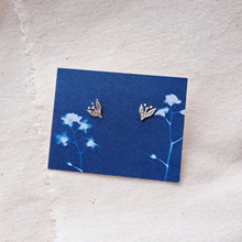 Load image into Gallery viewer, Silver leaf and berry stud earrings on indigo blue forget-me-not cyanotype image backing card 
