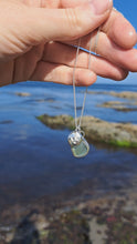 Load and play video in Gallery viewer, Sea Green Sea Glass &amp; Flying Birds Pebble Necklace | Cornish Sea Glass Treasure Necklace
