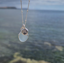 Load and play video in Gallery viewer, Light Blue Sea Glass &amp; Crashing Wave Pebble Necklace | Cornish Sea Glass Treasure Necklace

