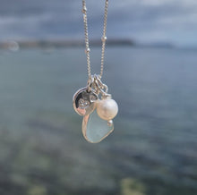 Load and play video in Gallery viewer, Small Aqua Sea Glass, Freshwater Pearl &amp; Double Heart Pebble Necklace | Cornish Sea Glass Treasure Necklace
