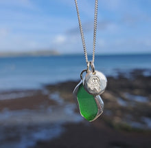 Load and play video in Gallery viewer, Emerald Green Sea Glass &amp; Crossbones Pebble Necklace | Cornish Sea Glass Treasure Necklace
