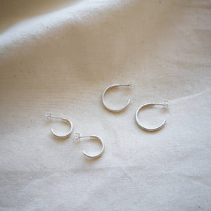 Mini and regular set of simple silver hoops with brushed satin matte finish
