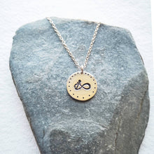 Load image into Gallery viewer, Infinity anchor symbol necklace recycled silver on grey stone white background
