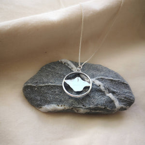 Isle of Wight necklace on grey stone with quartz on calico fabric