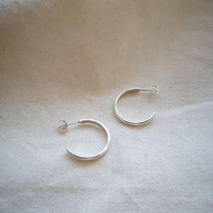 Classic recycled silver hoops side view with scroll back fittings