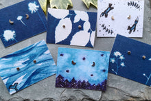 Load image into Gallery viewer, Small recycled silver moon studs on a selection of eco-friendly illustrated backing cards
