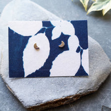 Load image into Gallery viewer, Eco silver tiny moon studs on blue leaves cyanotype recycled cotton backing card on slate
