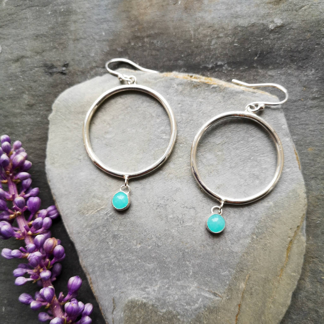 Recycled silver drop hoop earrings with amazonite turquoise colour stone, on slate with purple flower 