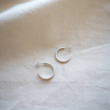 Load image into Gallery viewer, Silver hoops handmade in Cornwall with satin matte finish side view
