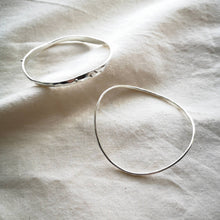 Load image into Gallery viewer, Two handmade Cornish wave silver bangles, one thicker with silver balls, one slim and minimal
