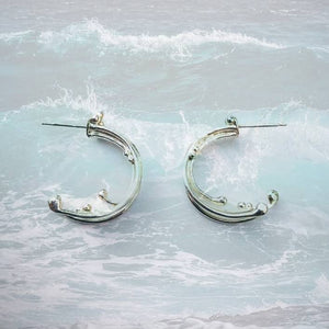 Wild Wave Eco Silver Hoop Earrings with crashing wave background